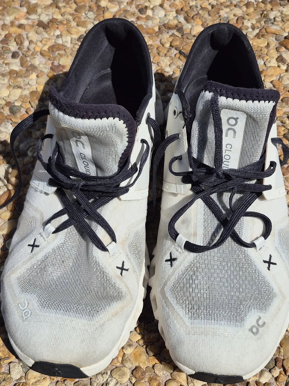 On Running Men’s Cloud Athletic Sneakers in White and Black